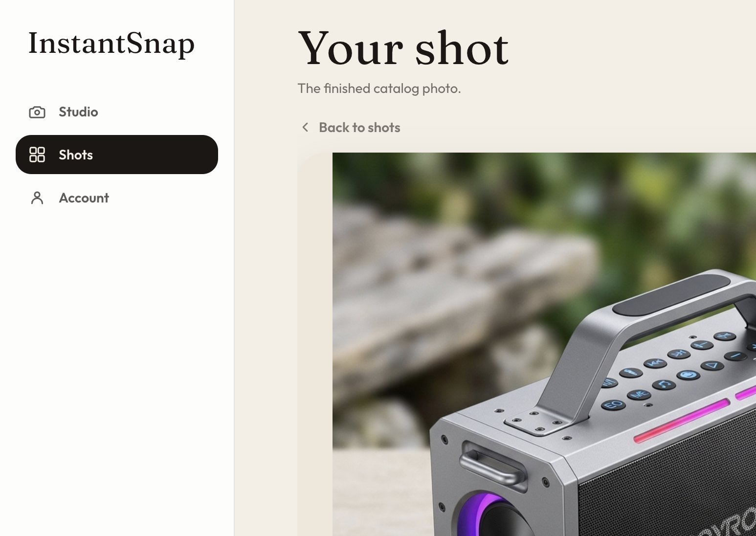 A finished InstantSnap catalog photo with its angle, background, frame, and Save photo